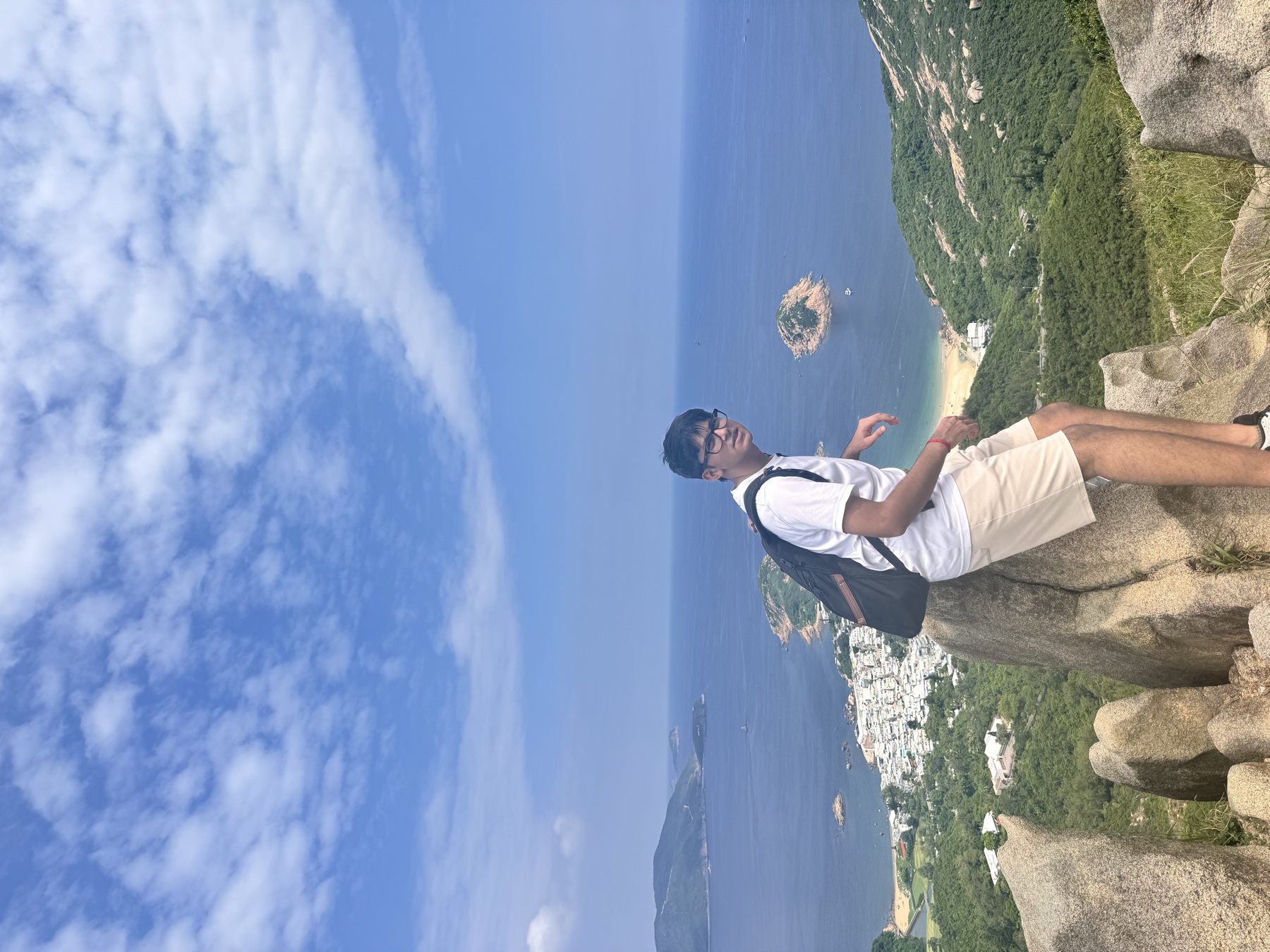 Shaurya Jain standing above the coastline